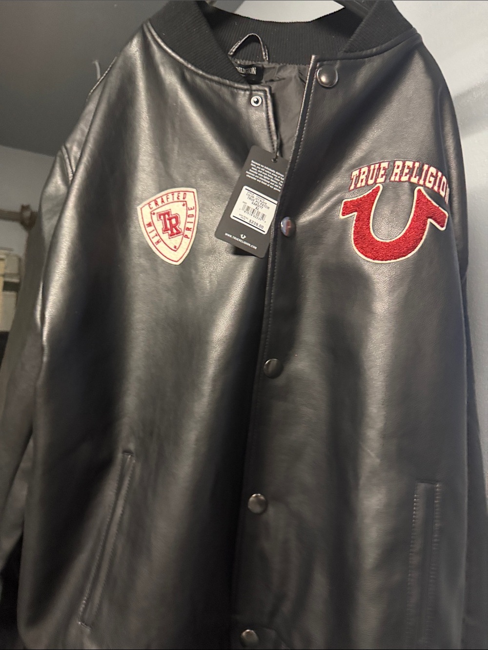 True Religion Black Leather Bomber Jacket with Red Crest Patches